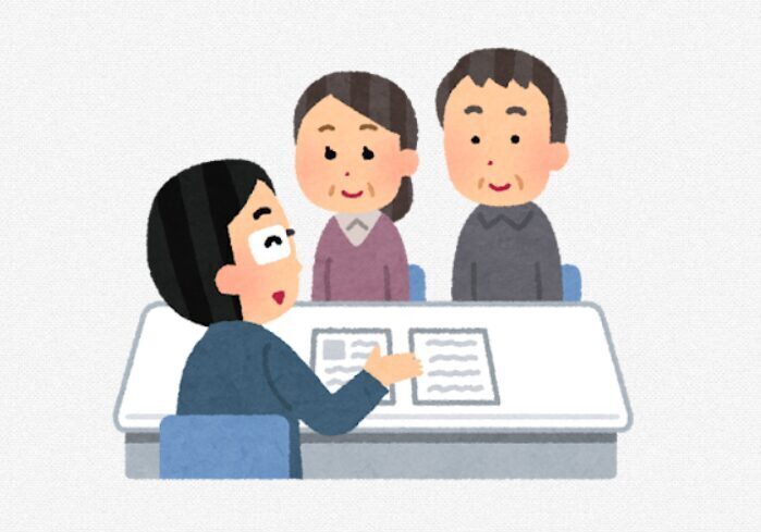 不動産屋さんに相談する初老夫婦のイラスト